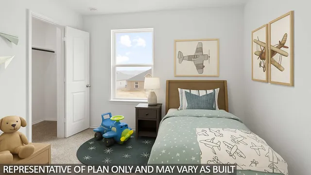 a bed room with a bed and a painting on the wall