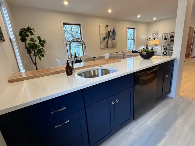 a bathroom with a sink double vanity and a mirror