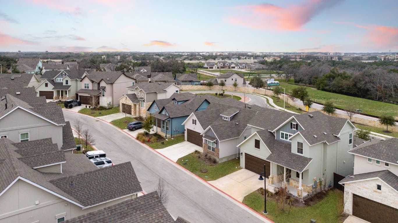 600 C-Bar Ranch Trail, Unit 113 Cedar Park, TX 78613 - Photo 4 of 4 an aerial view of residential houses with outdoor space
