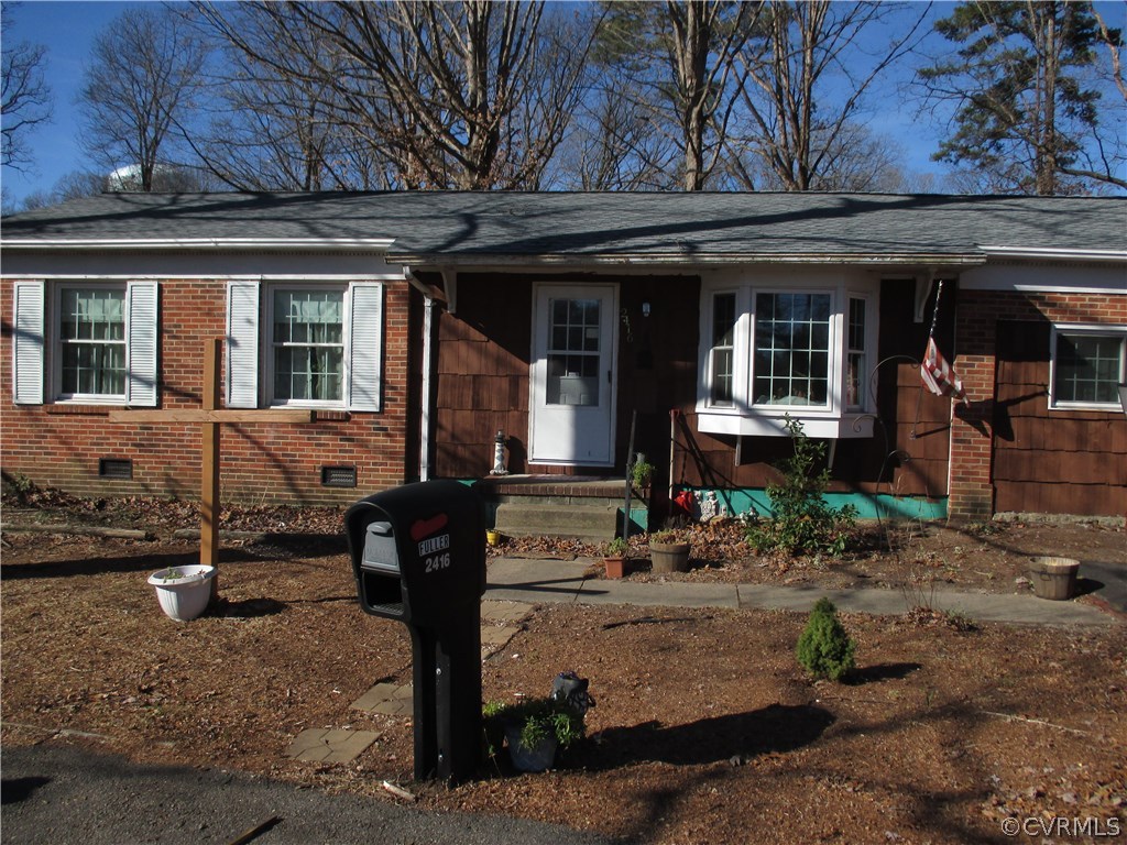 Brick Front Ranch With Brand New Roof and Paved Ci