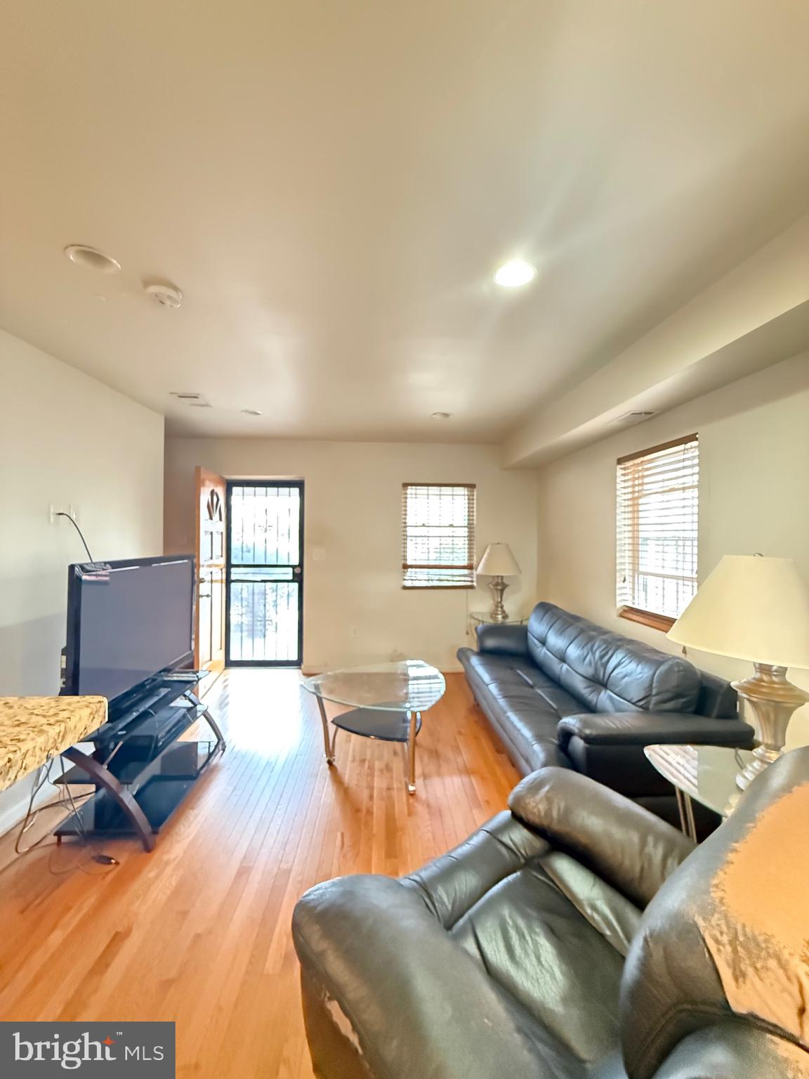 3321 18th Place Southeast Washington, DC 20020 - Photo 2 of 11 a living room with furniture window and a wooden floor