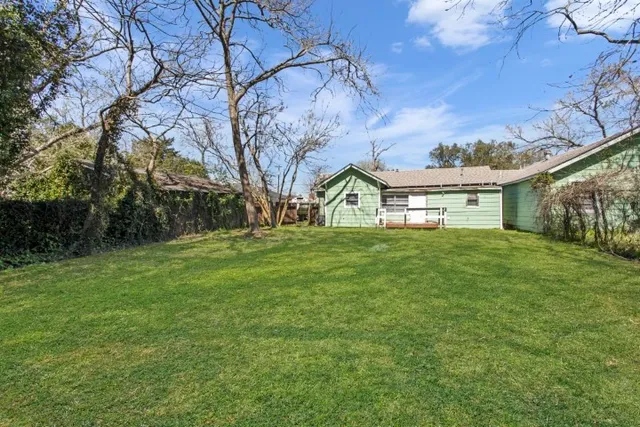 a house view with garden space