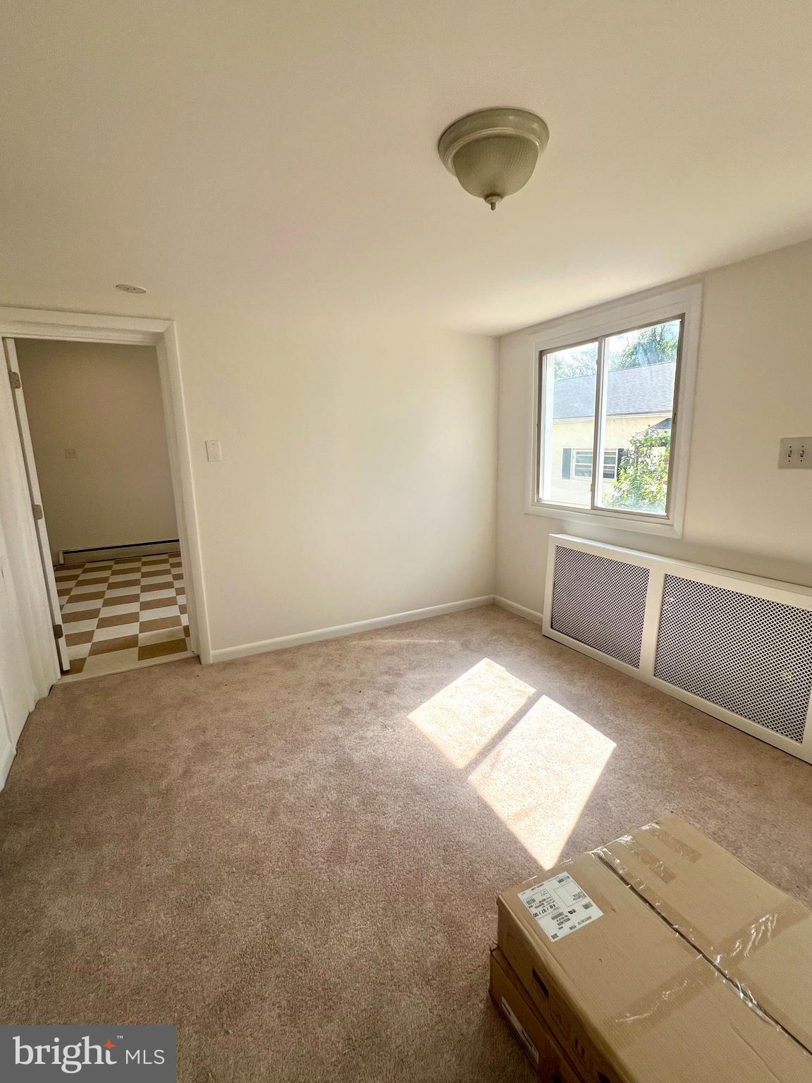 730 Richey Avenue, Unit 1 Oaklyn, NJ 08107 - Photo 3 of 11 an empty room with windows