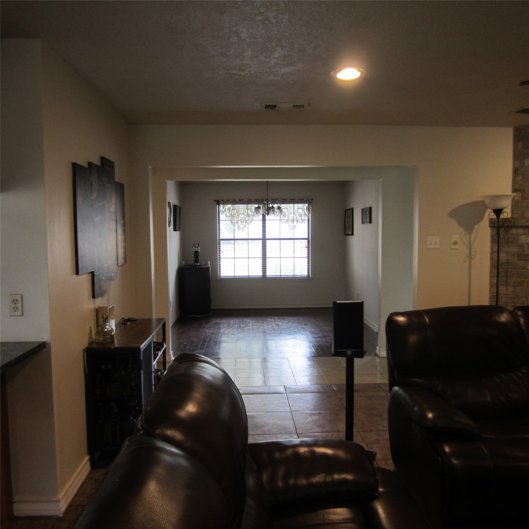 512 County Road 2222 Cleveland, TX 77327 - Photo 31 of 41 View from the back door looking past the living room into the formal dining.