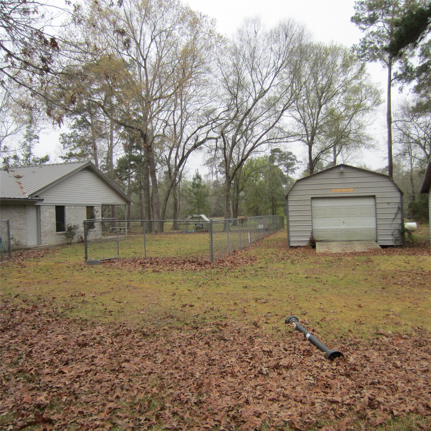 512 County Road 2222 Cleveland, TX 77327 - Photo 7 of 41 Shop next to the main house.