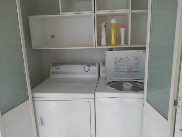 204 Nottingham Road Dickson, TN 37055 - Photo 14 of 18 utility off of master bath and sunroom