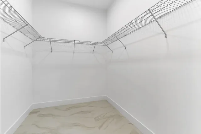 a view of a room with racks on the wall