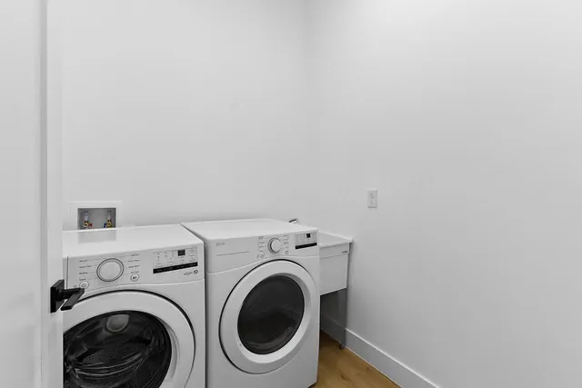 a utility room with dryer and washer