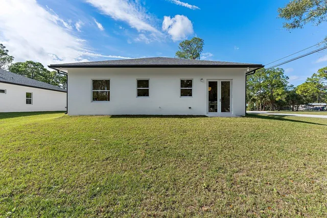 a house with yard in front of it
