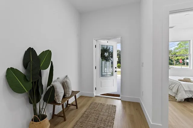 a view of entryway with wooden floor
