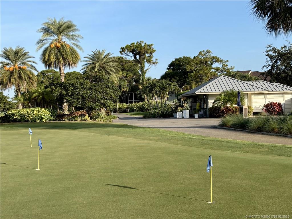 Undisclosed Address Stuart, FL 34997 - Photo 12 of 20 a swimming pool with outdoor seating and yard