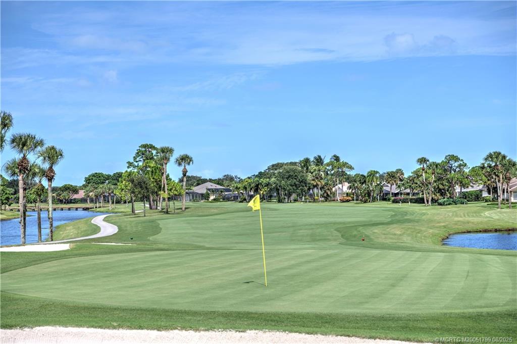 Undisclosed Address Stuart, FL 34997 - Photo 13 of 20 a view of a big yard with a large tree