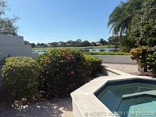 a view of a lake with a yard