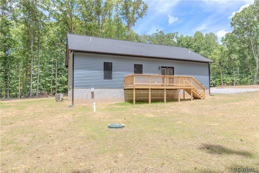 4243 Three Bridge Road Powhatan, VA 23139 - Photo 29 of 32 a house with trees in the background