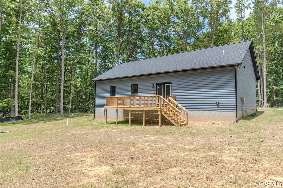 4243 Three Bridge Road Powhatan, VA 23139 - Photo 30 of 32 a house with trees in the background