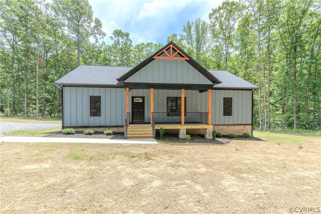 4243 Three Bridge Road Powhatan, VA 23139 - Photo 31 of 32 a house with trees in the background