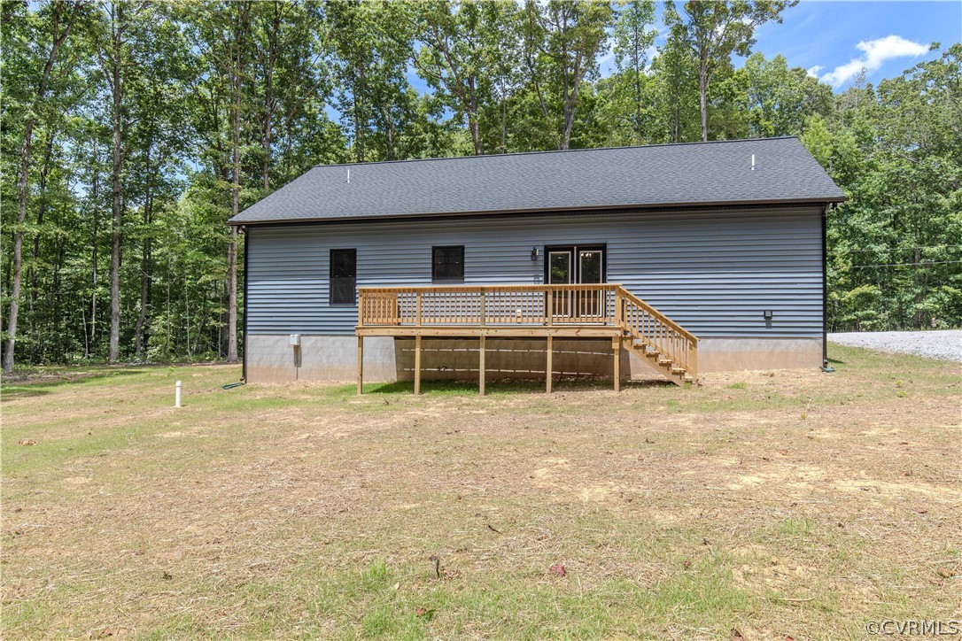 4243 Three Bridge Road Powhatan, VA 23139 - Photo 5 of 32 a house with yard in front of it