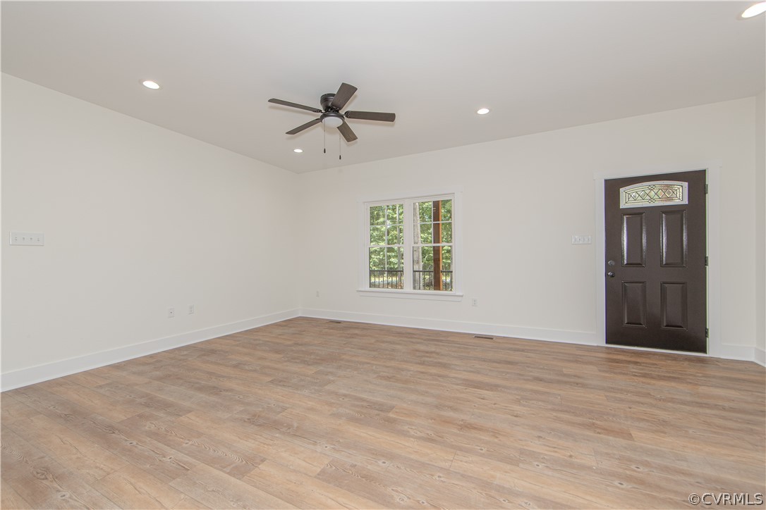 4243 Three Bridge Road Powhatan, VA 23139 - Photo 8 of 32 a view of an empty room with a window