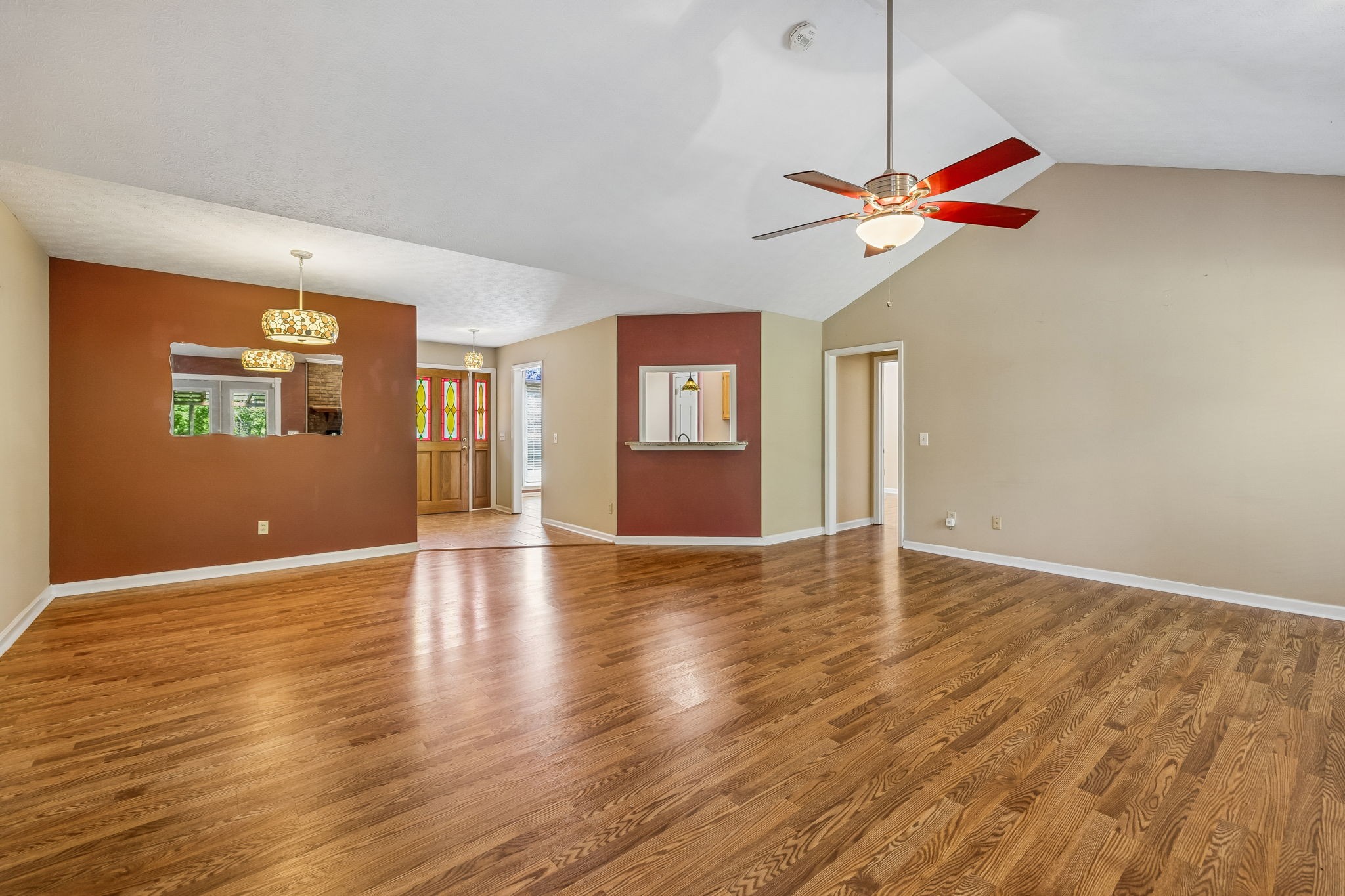 107 Keri Drive Pleasant View, TN 37146 - Photo 12 of 40 a view of an empty room with window and wooden floor