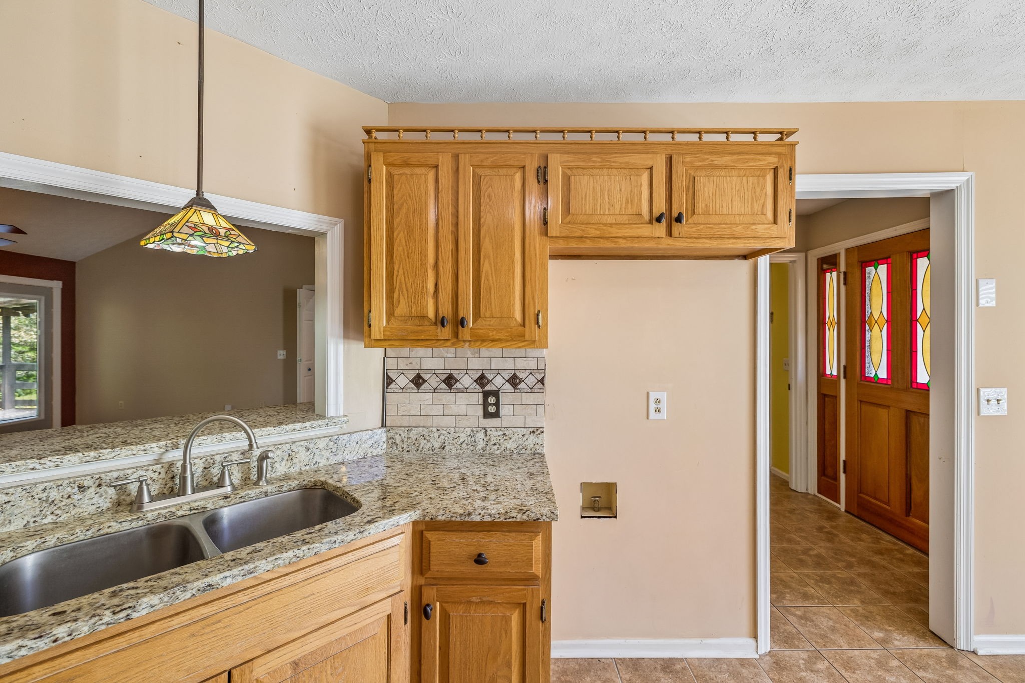 107 Keri Drive Pleasant View, TN 37146 - Photo 7 of 40 a bathroom with a granite countertop sink a mirror and a shower