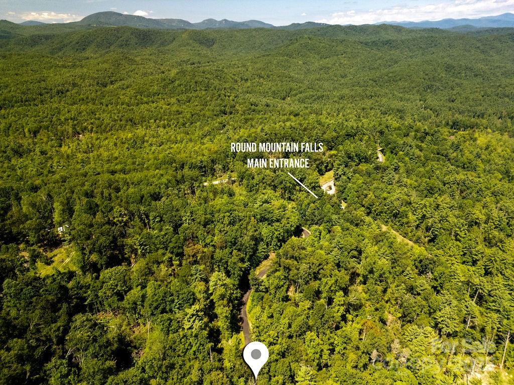 Lot 11 Silver Maple Trail Brevard, NC 28712 - Photo 15 of 21 a view of a lush green field with an ocean view