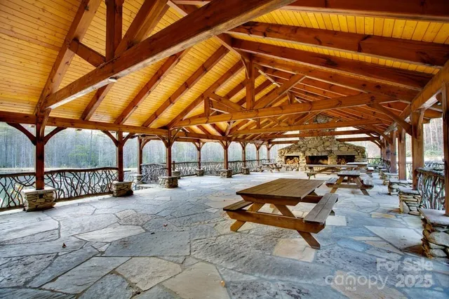 a backyard of a house with yard and tree