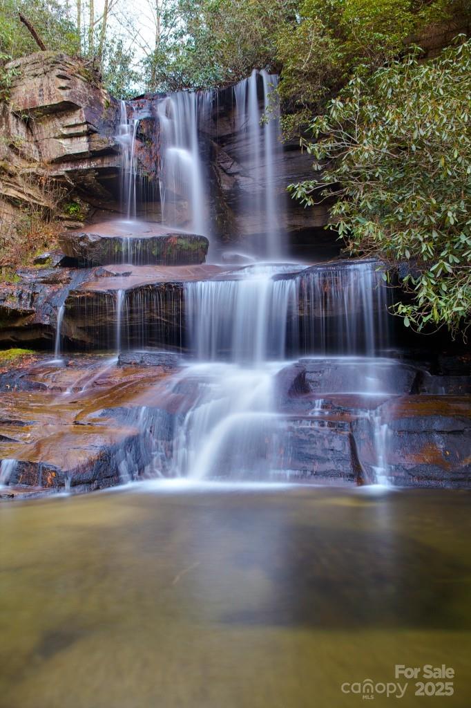 Lot 11 Silver Maple Trail Brevard, NC 28712 - Photo 20 of 21 a view of a swimming pool with an outdoor space