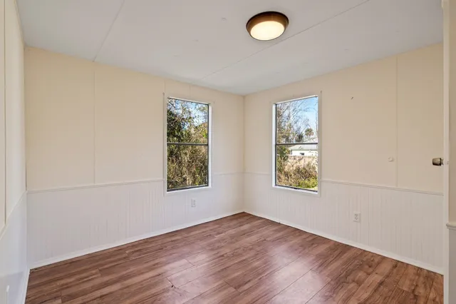 an empty room with windows