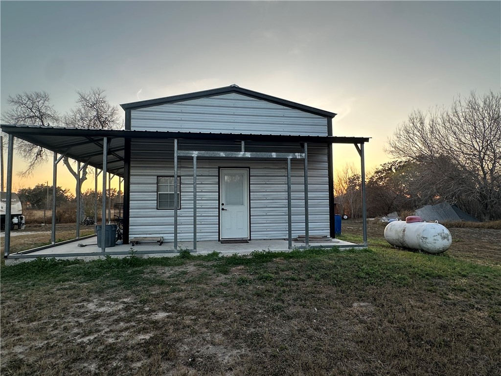 1900 Viggo Road Beeville, TX 78102 - Photo 2 of 10 a front view of a house with garden