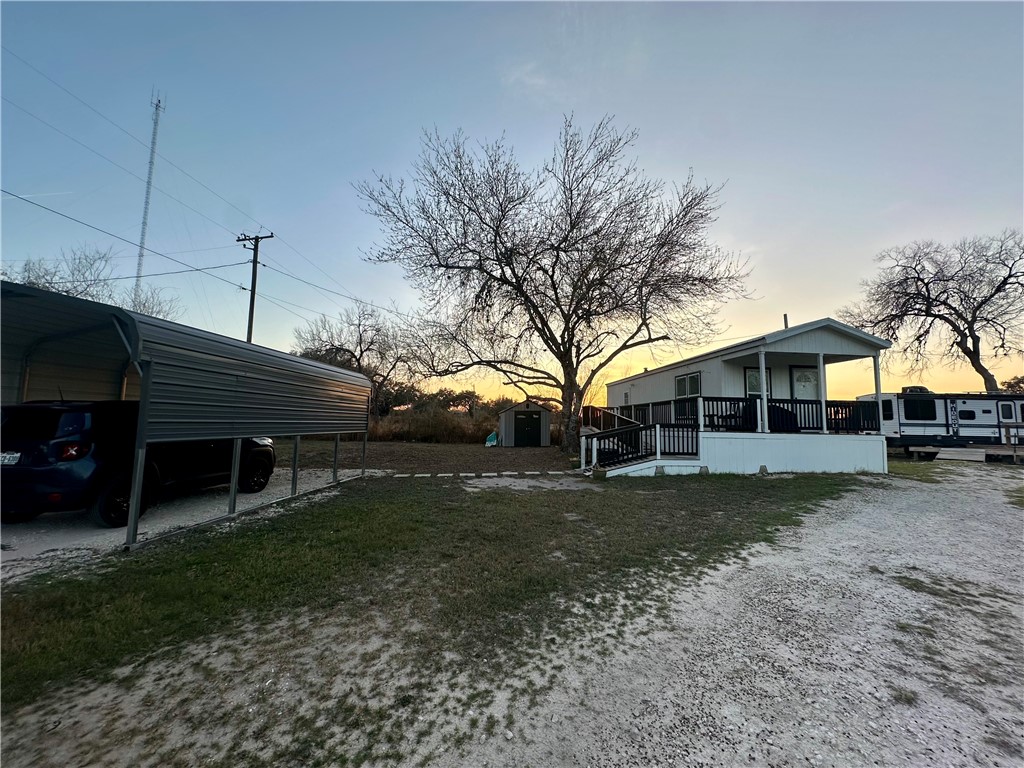 1900 Viggo Road Beeville, TX 78102 - Photo 9 of 10 a view of a house with a yard