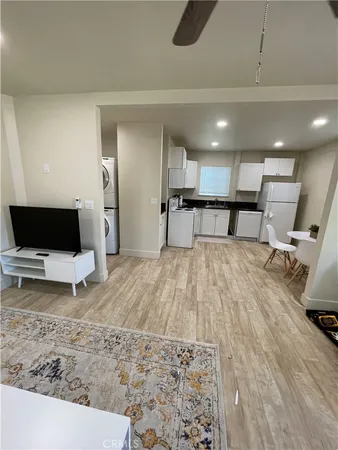a living room with a couch and a flat screen tv