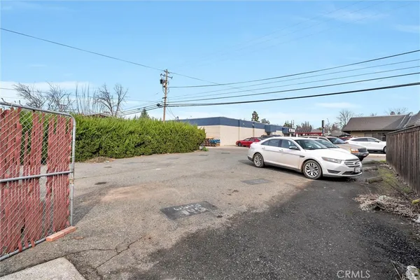 a view of parking space with parked cars