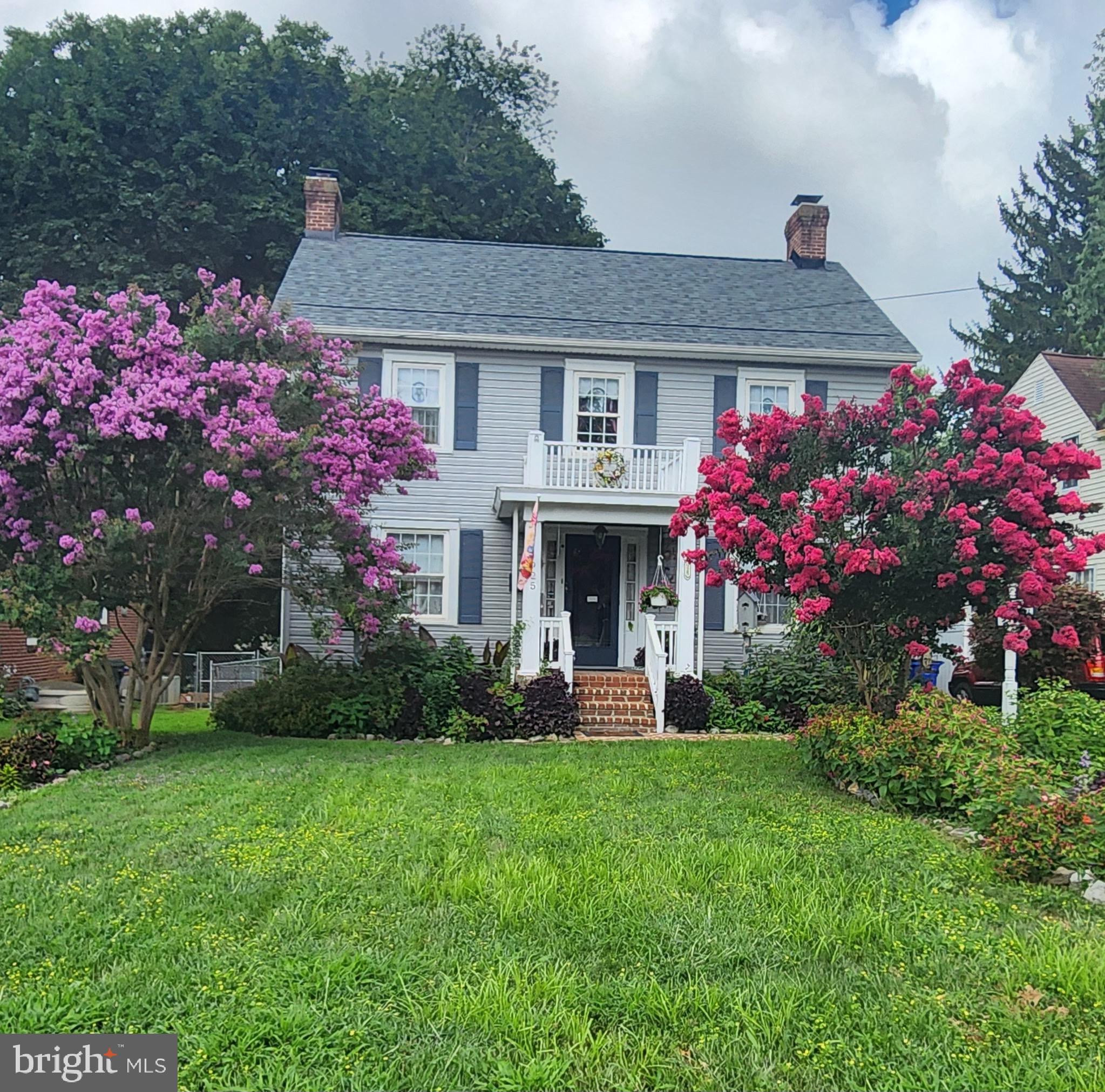 Summer view of the front of the home