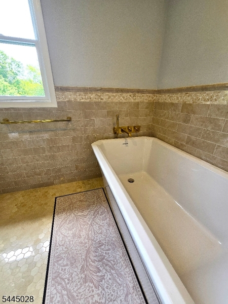126 Blackwell Road Pennington, NJ 08534 - Photo 34 of 44 a bath tub sitting in a bathroom next to a window