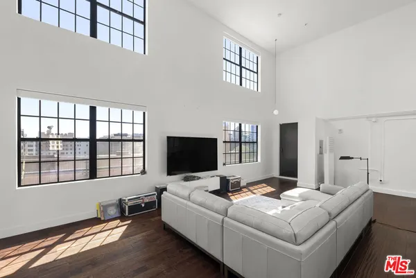 a kitchen with granite countertop stainless steel appliances and wooden cabinets