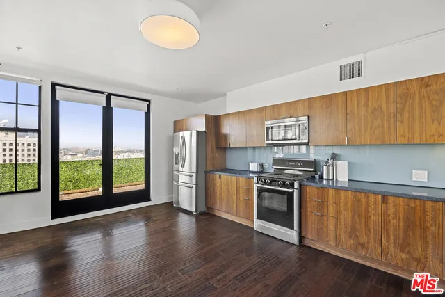 a view of a chairs and table on the terrace