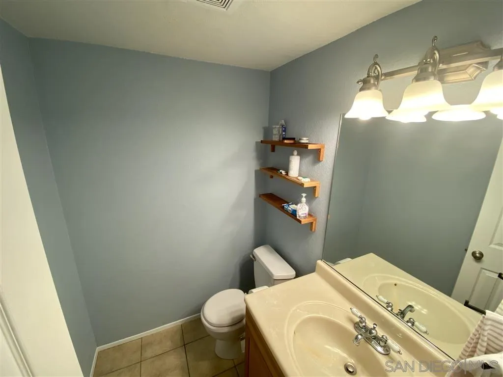 2616 Alpine Boulevard, Unit 29 Alpine, CA 91901 - Photo 9 of 20 a bathroom with a sink and toilet