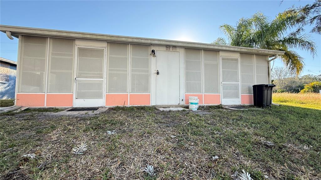 12611 1st Isle Hudson, FL 34667 - Photo 16 of 19 a view of back yard of the house