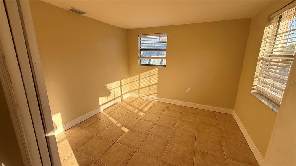 12611 1st Isle Hudson, FL 34667 - Photo 5 of 19 a view of an empty room and window