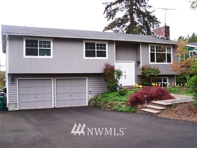 24320 6th Place West Bothell, WA 98021 - Photo 1 of 1 a front view of a house with a garden