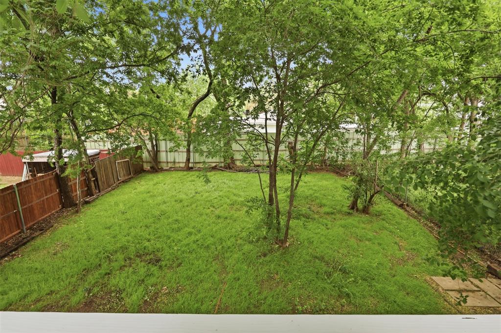 716 Lakeland Road Lake Dallas, TX 75065 - Photo 20 of 31 a view of yard with green space