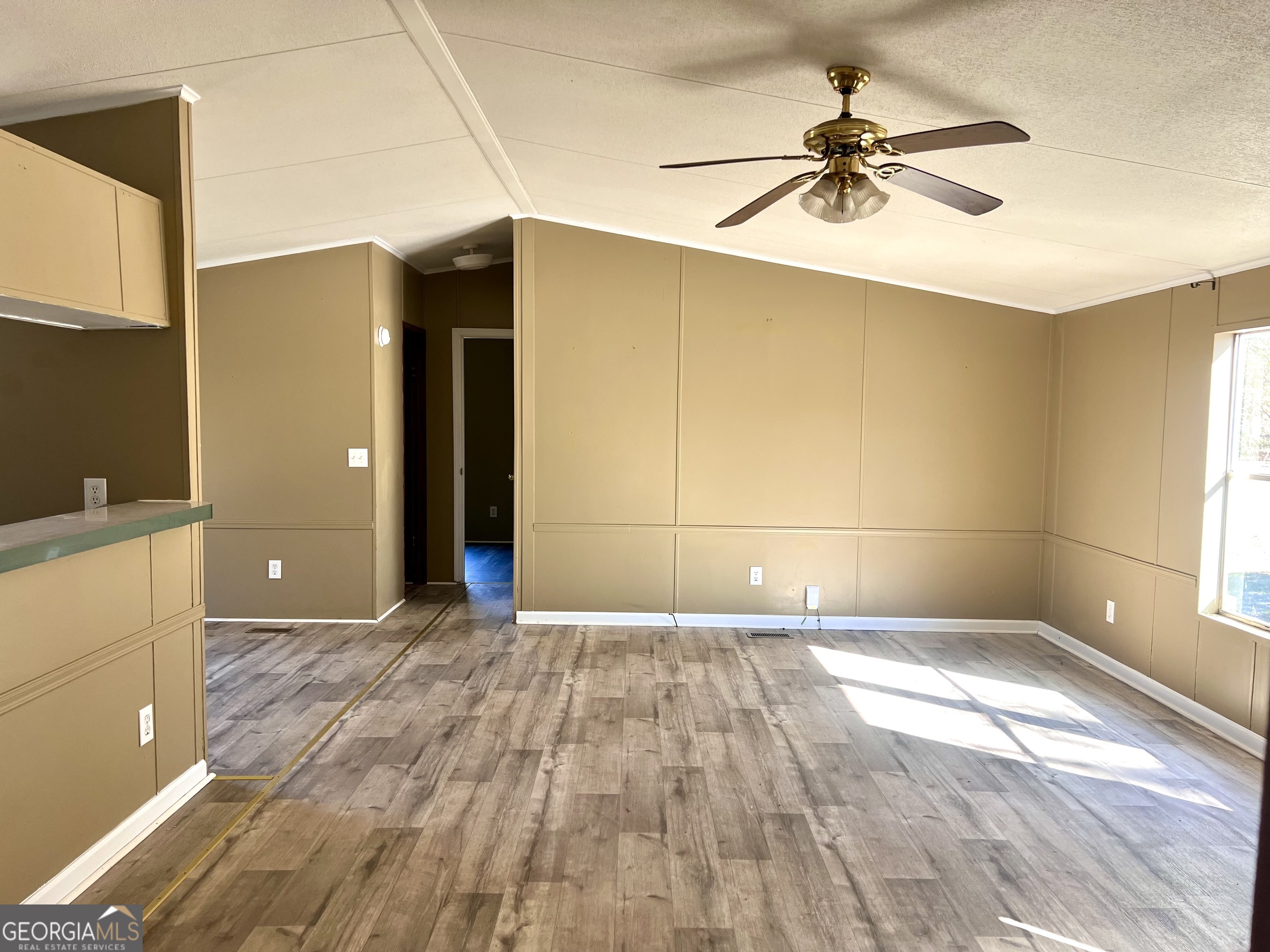 141 Shady Oaks Road Eastman, GA 31023 - Photo 12 of 26 a view of an empty room with a window