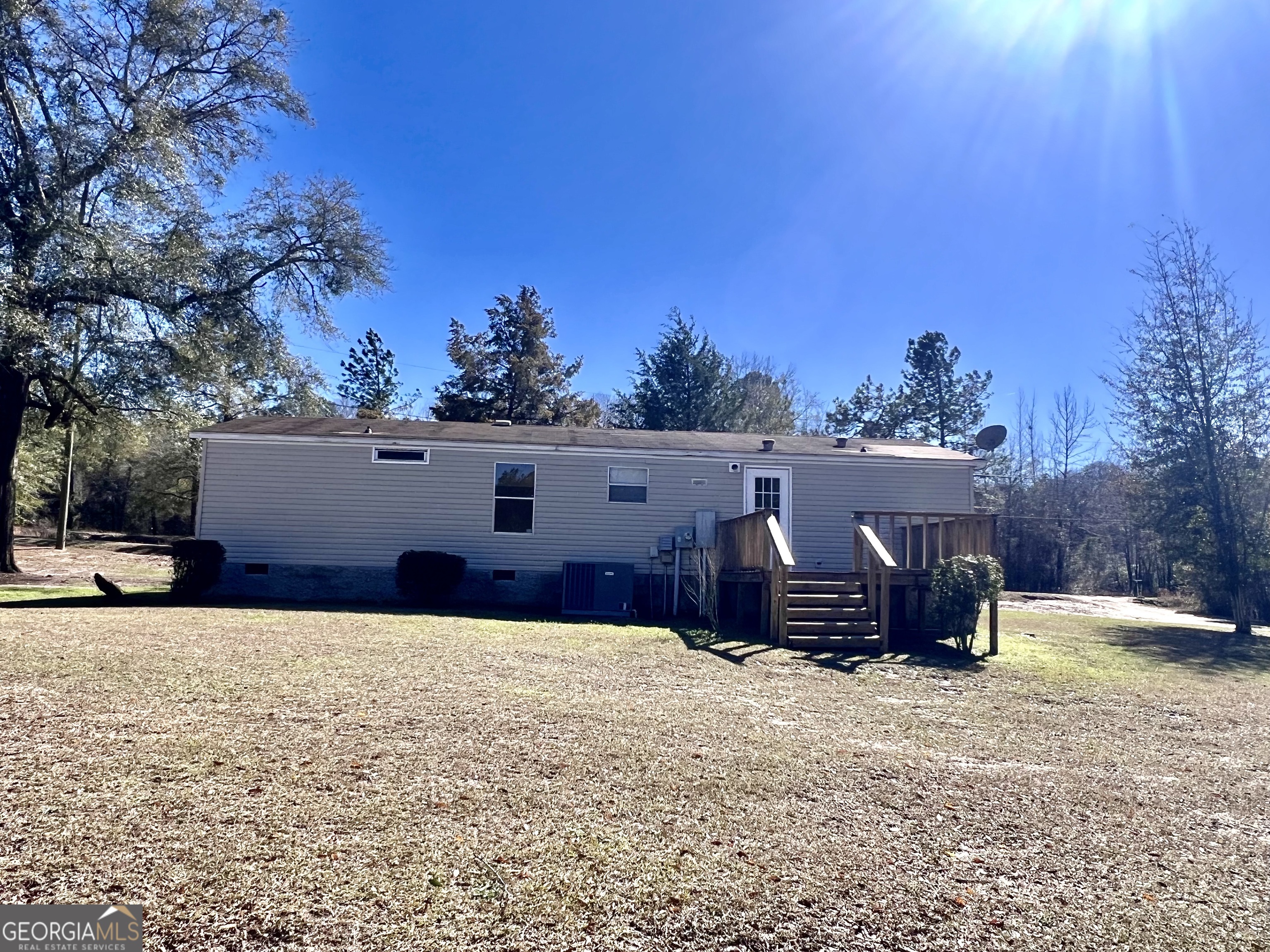 141 Shady Oaks Road Eastman, GA 31023 - Photo 3 of 26 front view of a house with a yard