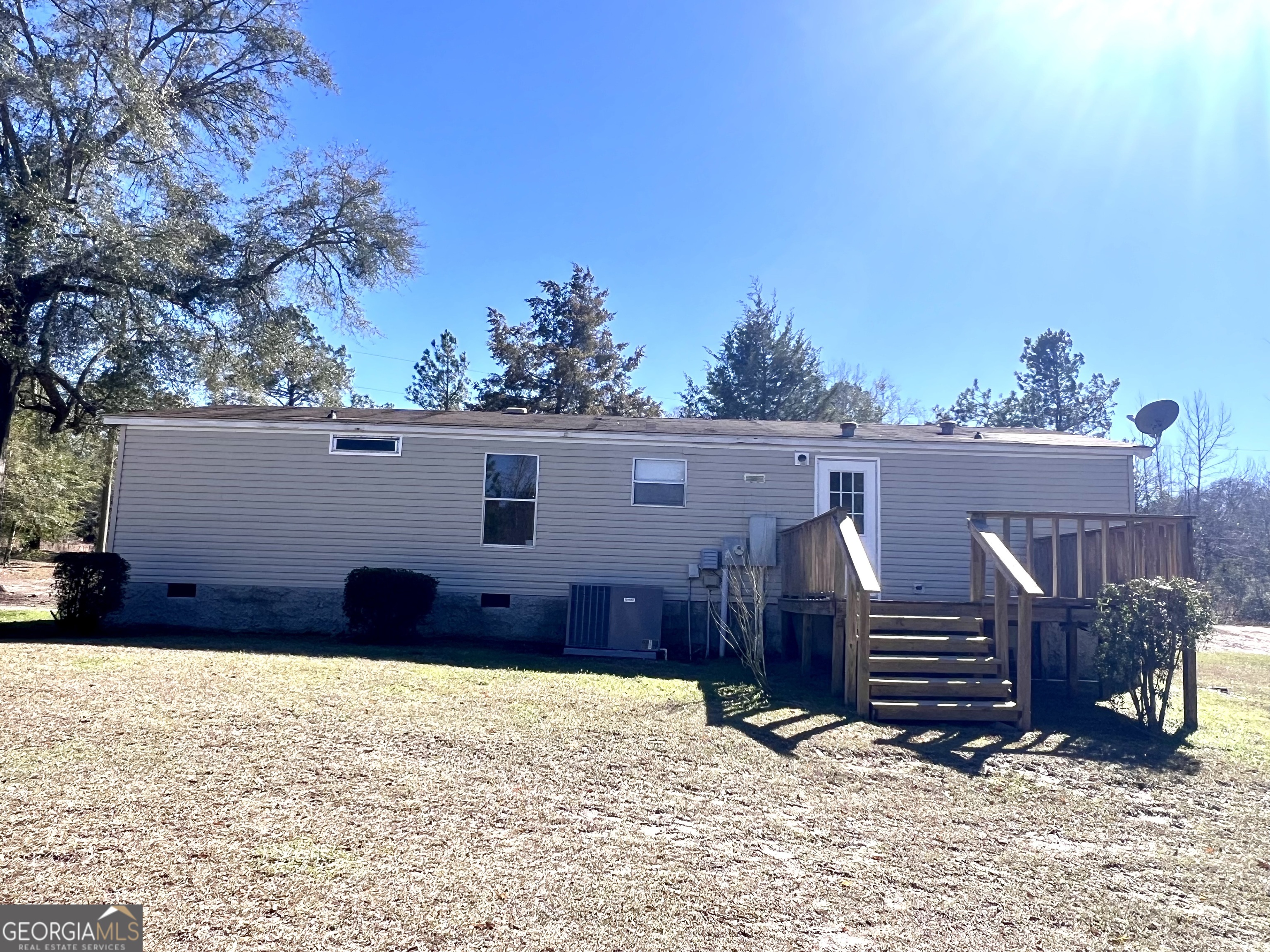 141 Shady Oaks Road Eastman, GA 31023 - Photo 4 of 26 front view of a house with a yard