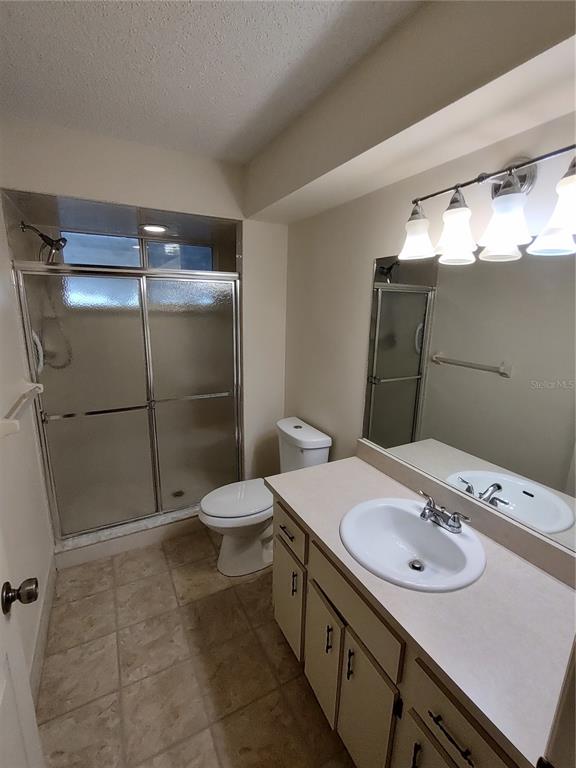 8435 Southwest 109th Lane Ocala, FL 34481 - Photo 20 of 28 a bathroom with a sink toilet and shower