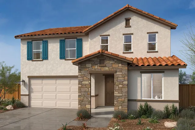 a front view of a house with a garage