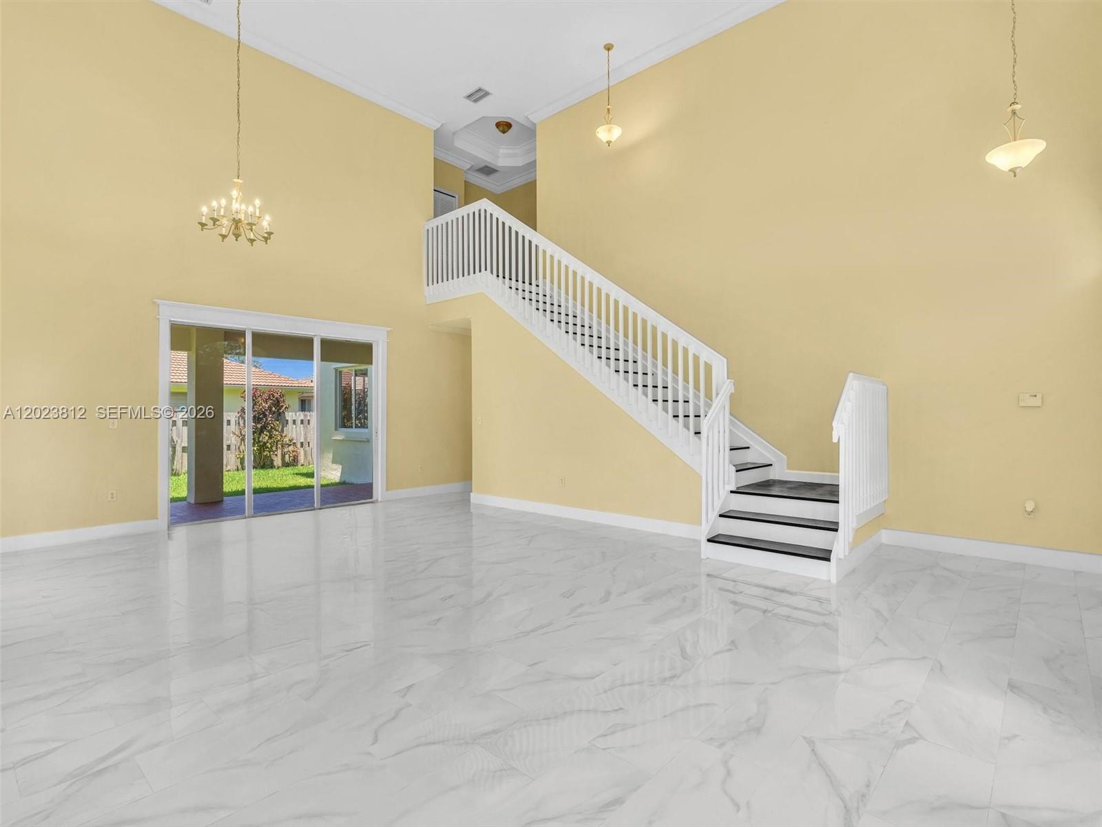 2864 Southwest 138th Path Miami, FL 33175 - Photo 9 of 40 a view of an entryway with wooden floor