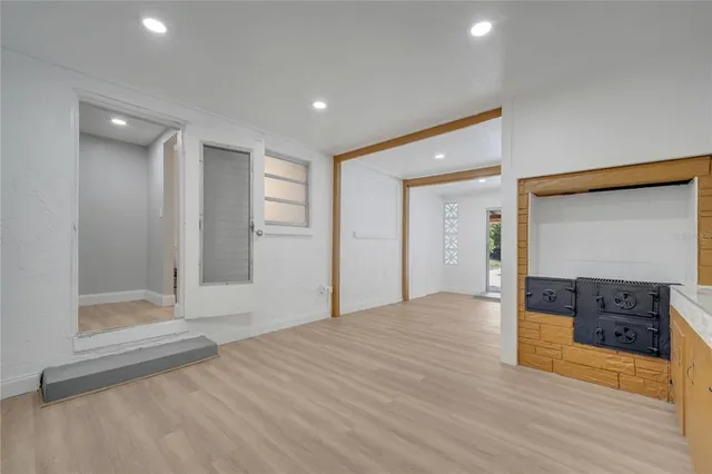 a bathroom with a glass shower door