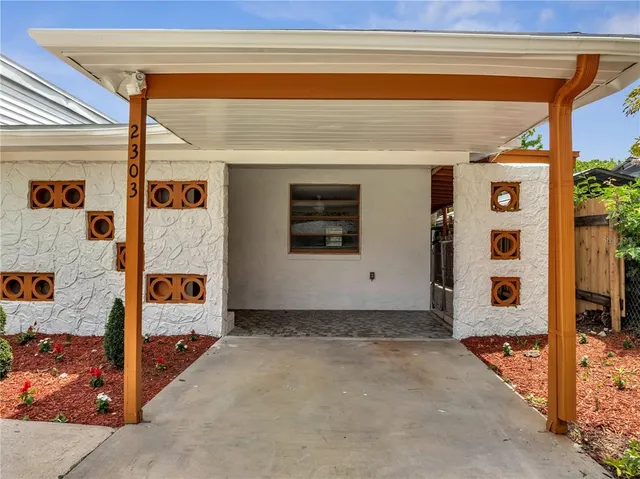 a view of front door and bedroom