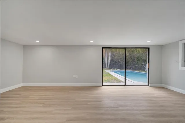 a view of a pathway both side of house